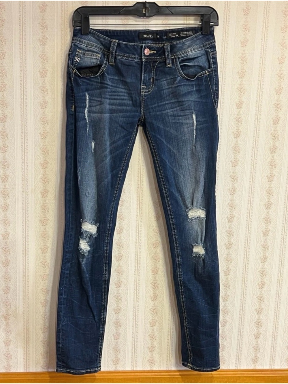 Distressed Dark Blue Women’s Jeans